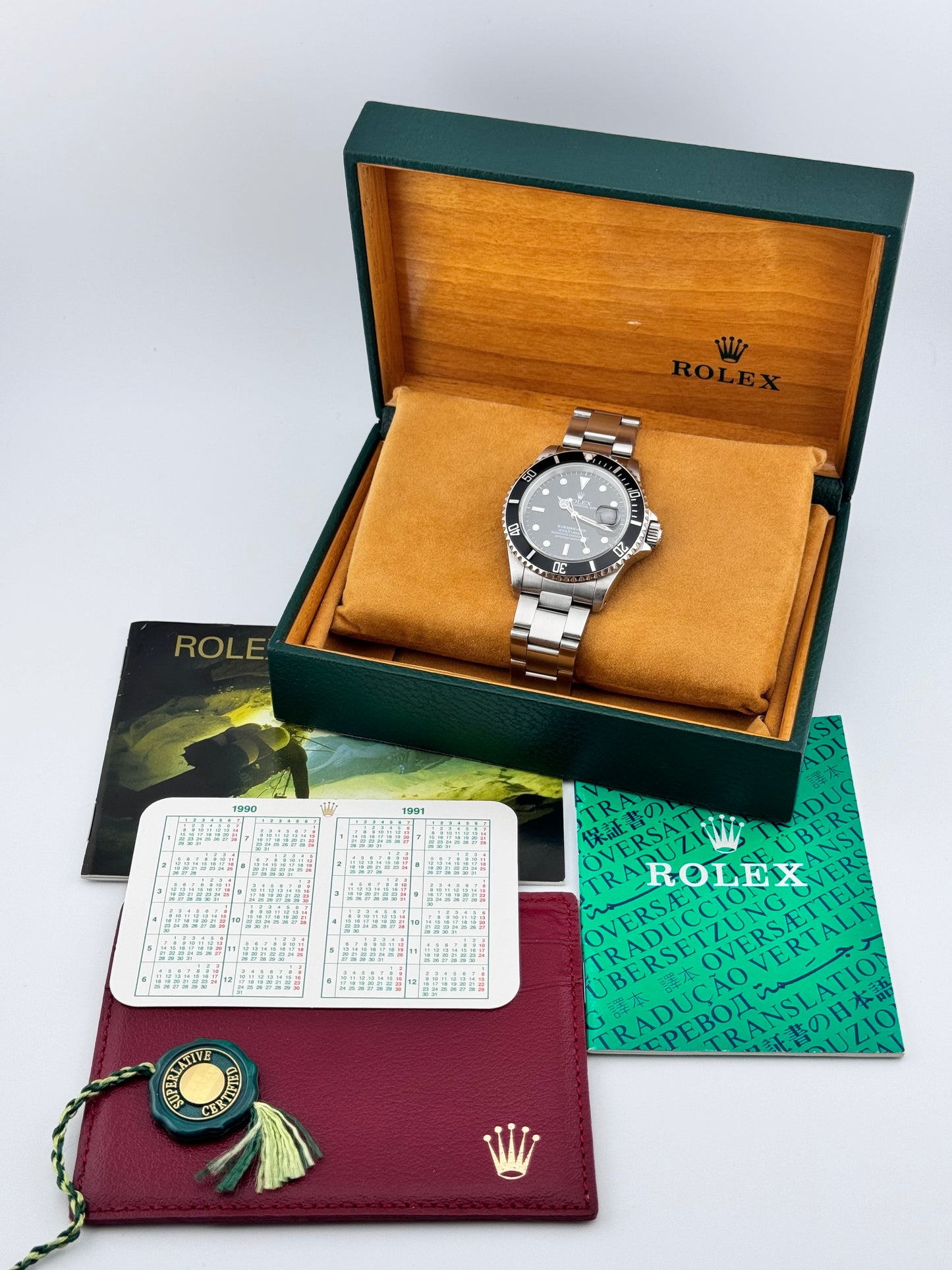 Rolex Oyster Perpetual Submariner Date - 16610 - Box and Papers