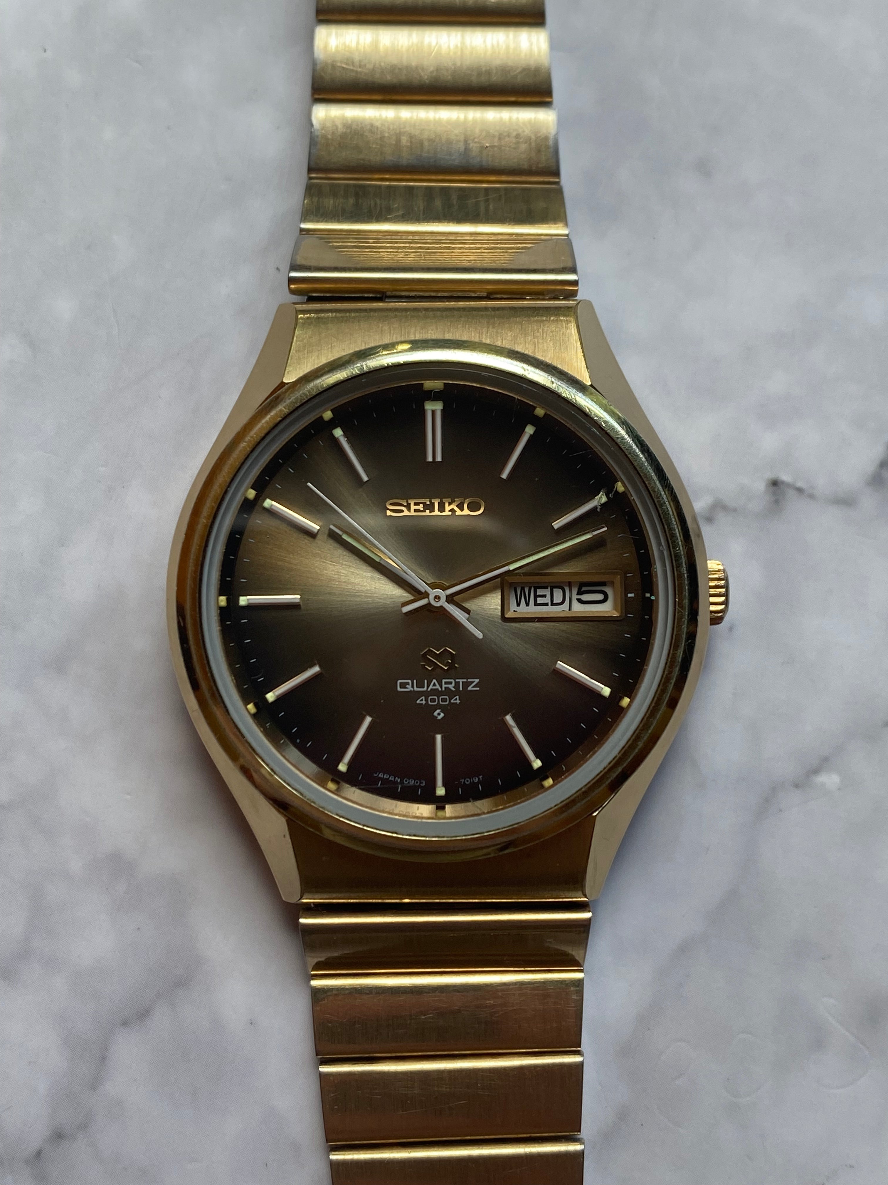 Seiko quartz hot sale 4004 gold